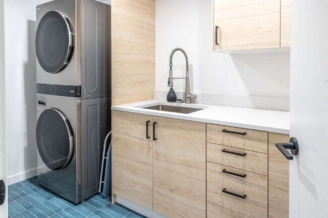 Building Photo - Modern Luxury Rental with Unobstructed Fla...