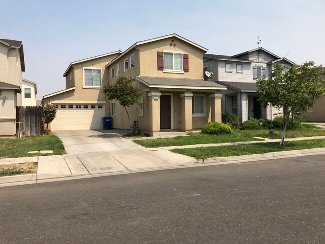 Building Photo - Three Bedroom Two Bathroom Two-Story Home for Rent