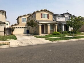 Building Photo - Three Bedroom Two Bathroom Two-Story Home for Rent