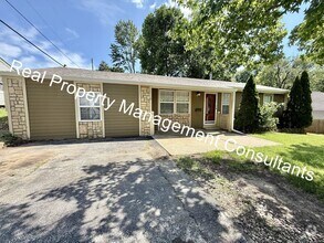 Building Photo - Updated 4 Bedroom, 2 Bath Home with Spacio...