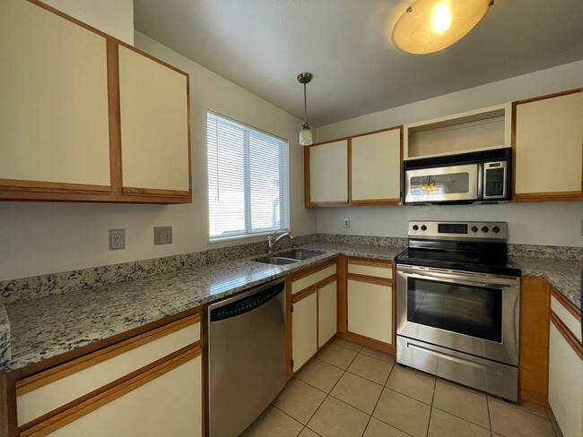 Building Photo - Cozy 2-Bedroom Top Floor Condo at Belmar P...