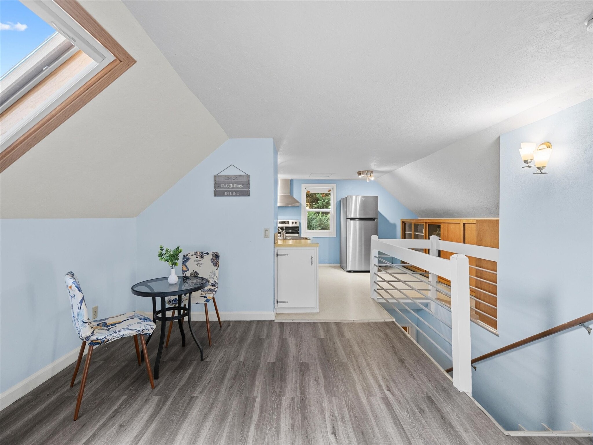 It features an open layout. - 9835 SW 80th Ave
