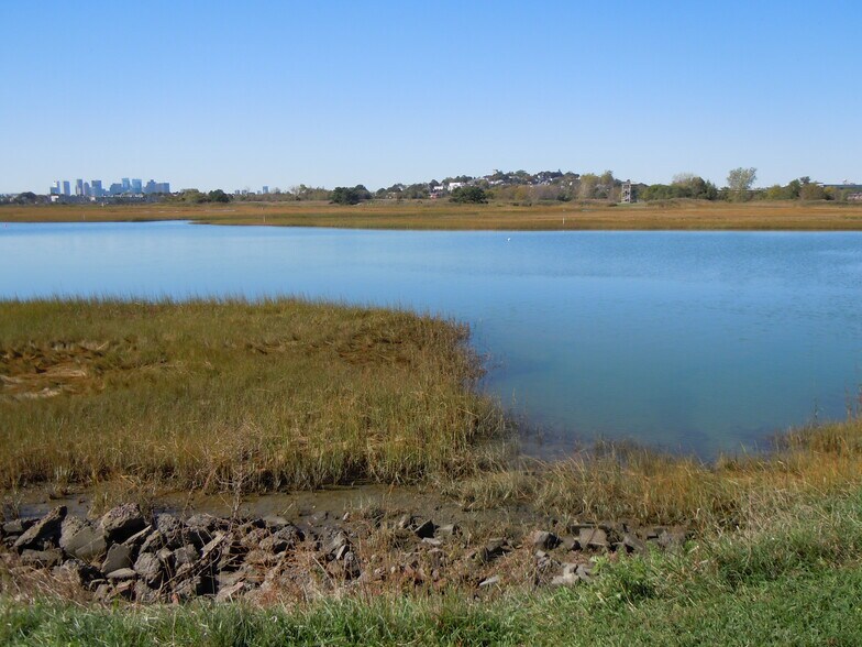 marsh and inlet at mid-tide looking across west to Orient Heights - 103 Summer St