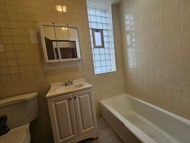 Building Photo - 4810 N Christiana Ave