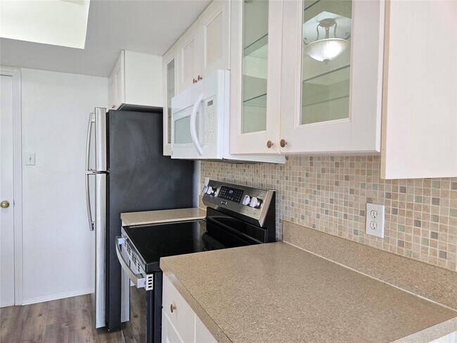 Building Photo - 4404 Travis Country Cir