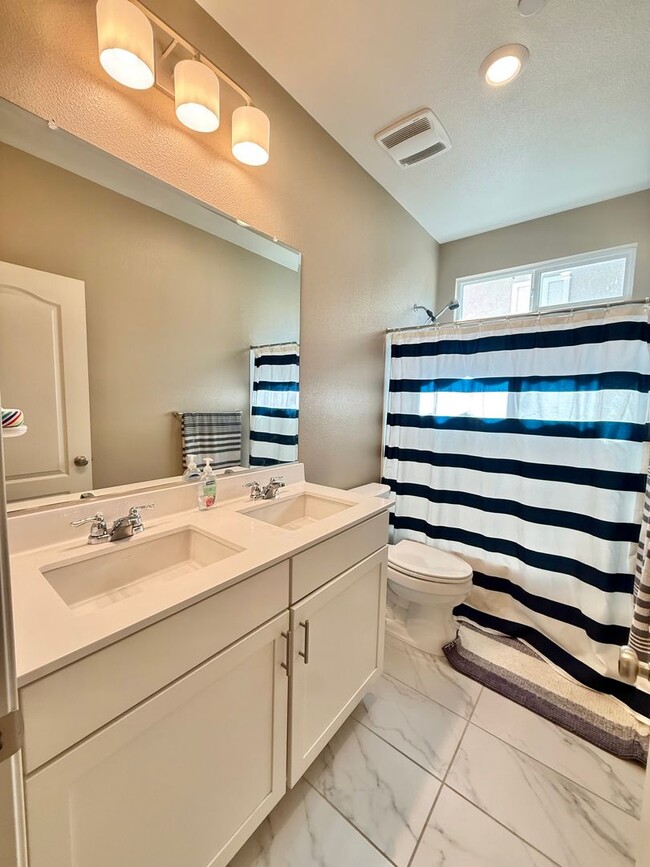 Building Photo - Spacious 5-Bedroom Home | Private Yard + Attached Garage