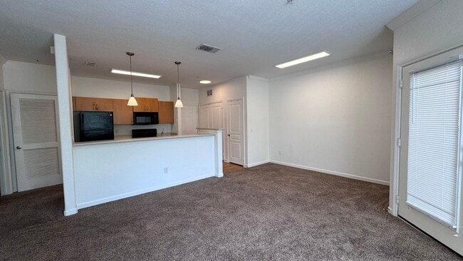 Building Photo - Gated Community Condo Now Available! LOW C...