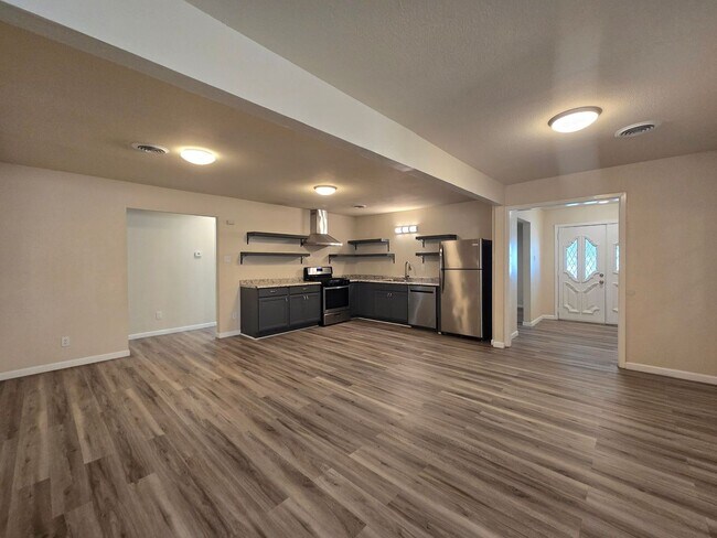 Building Photo - RENT REDUCTION - AVAILABLE NOW!