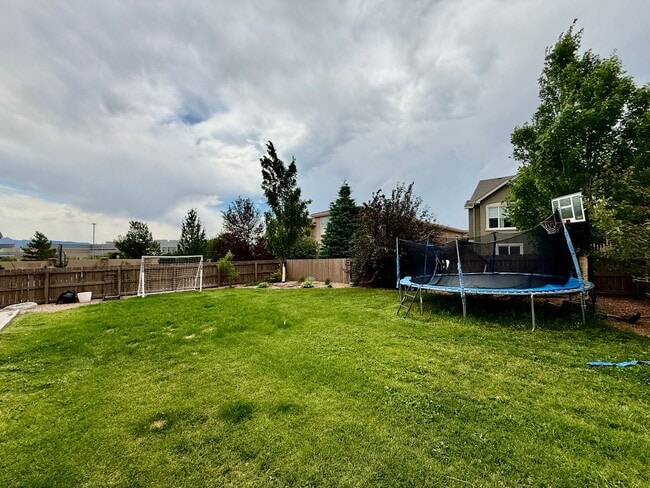 Building Photo - Spacious & Stylish 5-Bedroom Home in Wolf ...