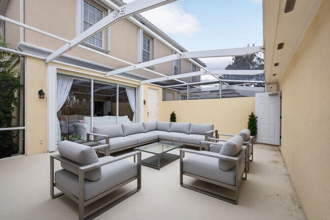Building Photo - "Charming 4-Bedroom Townhouse Oasis on Barcelona Drive with 3 Full Baths – Spacious 1867 Sq. Ft. ...