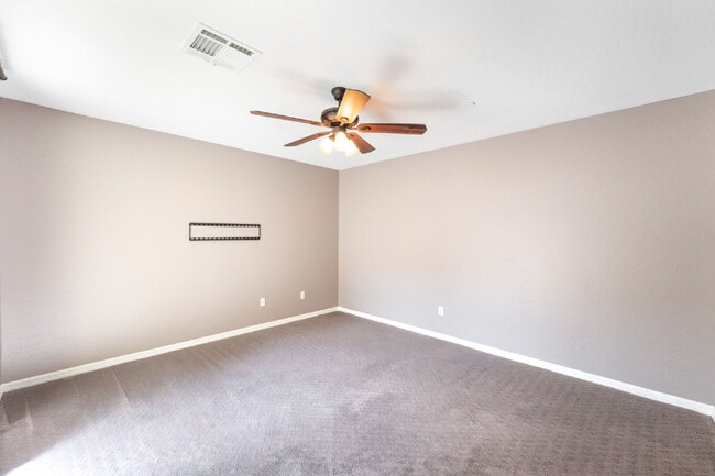 Building Photo - 3 bedroom, 2.5 bathroom Home with a 2 car garage  in  a Gated Community!