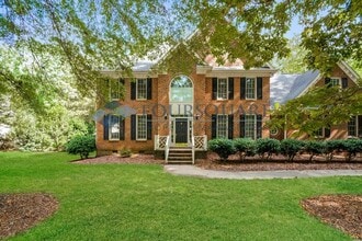 Building Photo - Spacious 4-Bed Custom Home with Bonus Room...