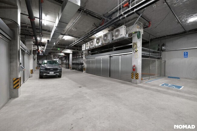 Building Photo - Act Fast: Luxury SoMa Corner Unit w/ EV Parking & Views