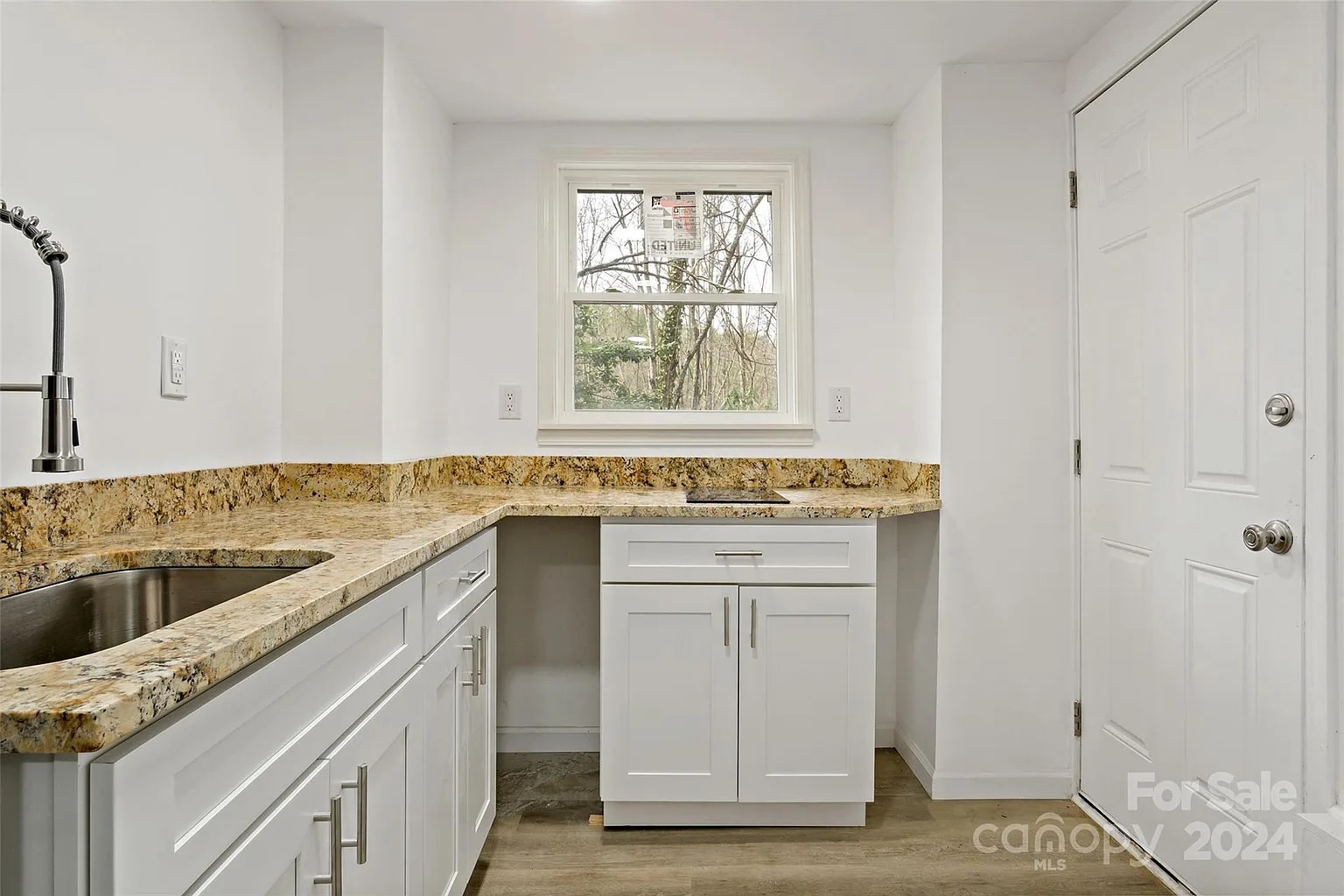 Kitchen looking towards main entrance - 228 Barrett Rd