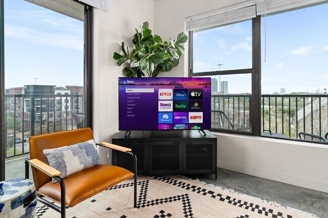 Building Photo - Midtown Magic: Big Savings + Big Perks!
