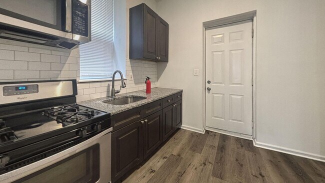 Building Photo - Modern Four-Bedroom Row Home in Kingsessing