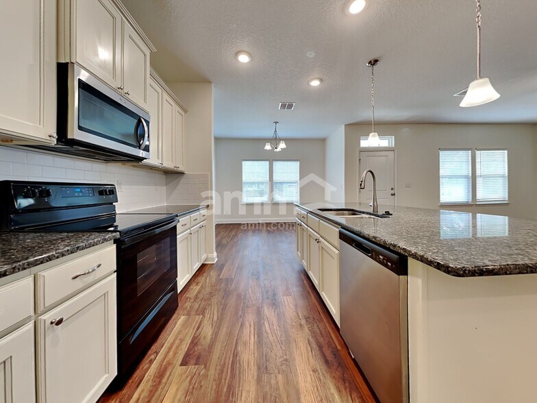 Building Photo - 644 Sunny Stroll Dr