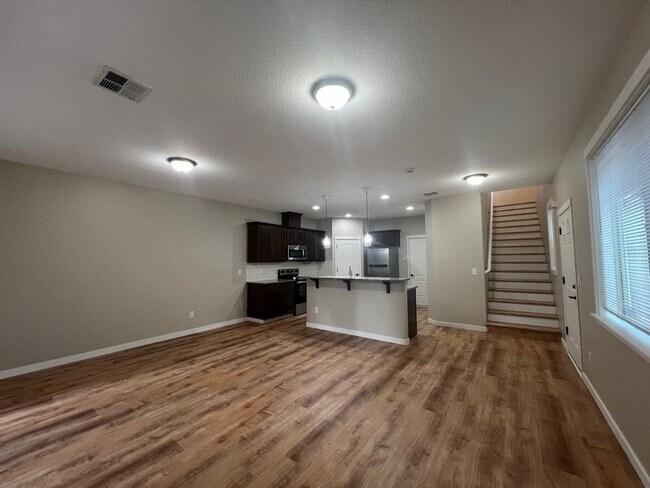 Building Photo - Recently Renovated! Spacious 3 Bedroom Home with Fenced Yard, Patio, and 2-Car Garage With Move I...