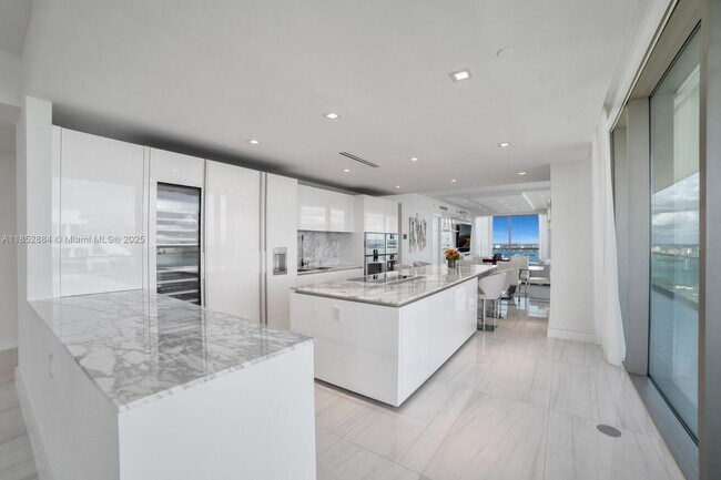Building Photo - 10203 Collins Ave