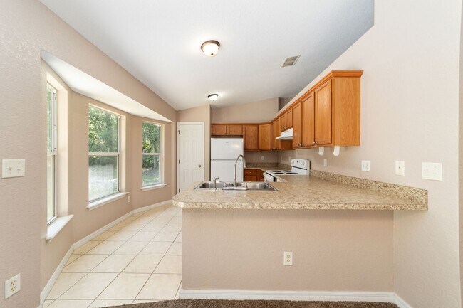 Building Photo - Peaceful 3-Bedroom Home with Open Floor Plan & Two-Car Garage in Rainbow Lakes Estates!