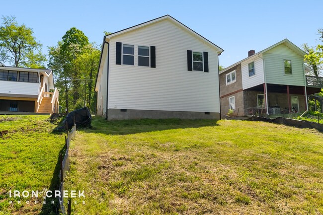 Building Photo - Bright and Modern: New Construction Three-...