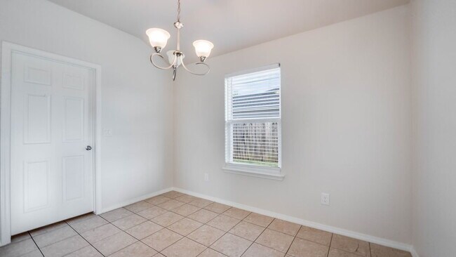 Building Photo - Recently Renovated with EV Charger & Spacious Backyard