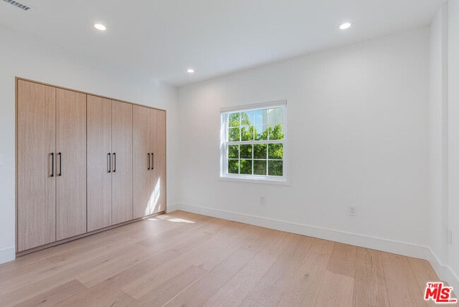 Building Photo - 5110 Garden Grove Ave