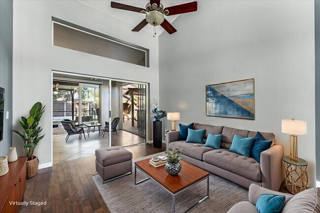 Building Photo - A vibrant 2-bedroom, 2-bathroom tropical retreat designed for both high-energy entertaining and l...