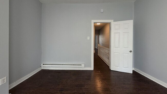 Building Photo - Updated 3 Bedroom 1.5 Bath Townhome w/ Paved Yard + Washer & Dryer