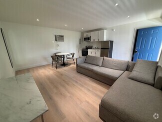 Building Photo - Quaint Furnished One Bedroom Oasis Minutes...