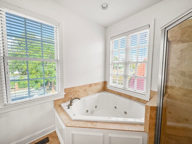 Building Photo - Fully Furnished Waterfront Elegance on Mai...