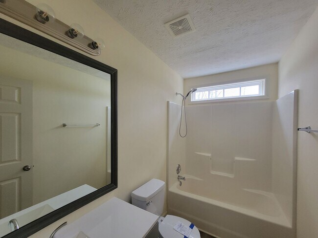 Building Photo - Lake Front Property. Loft - Swim/Tennis - Stainless Steel Appliances