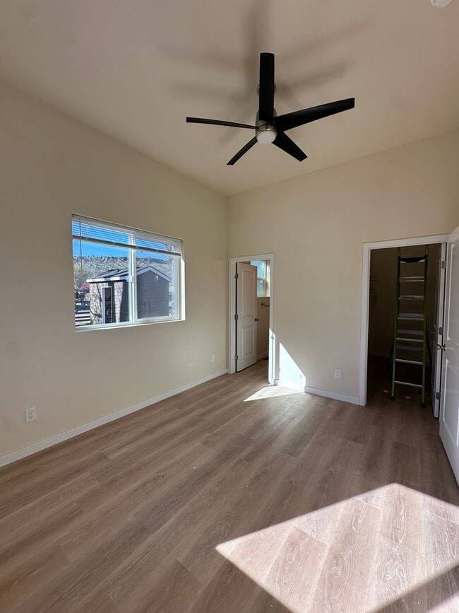 Building Photo - Bright & New 2 Bed / 2 Bath with Vaulted Ceilings & Covered Parking!