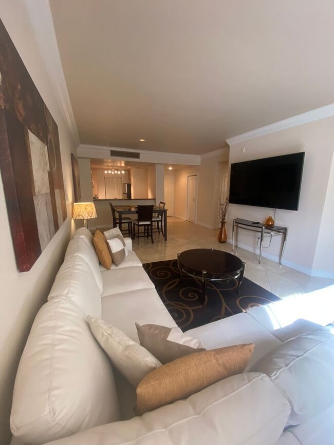 Building Photo - Long or short term available!  Live in lux...