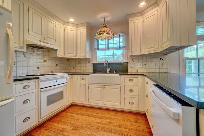 Building Photo - Reduced & Ready NOW! WATERFRONT Home in Wi...