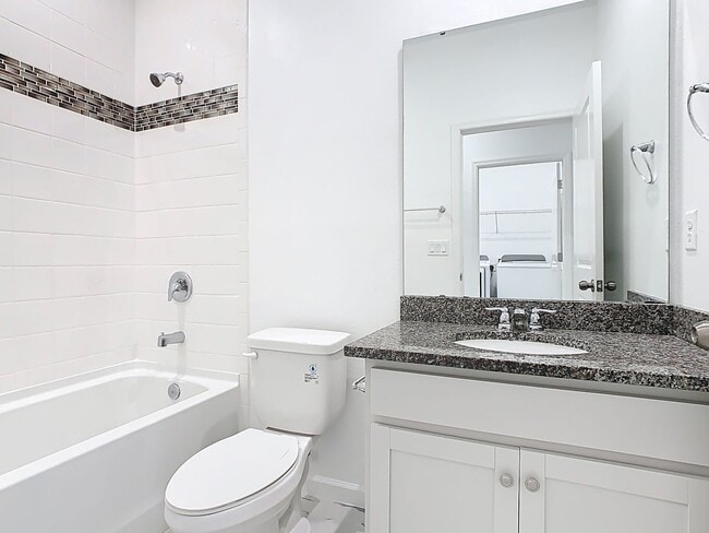 Building Photo - JUST REDUCED! PET FRIENDLY! Experience Com...