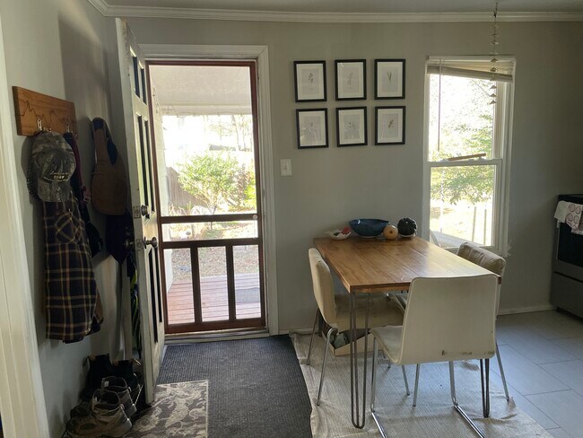 Dedicated dining area with sliding door access to outdoor space. - 520 Commonwealth St