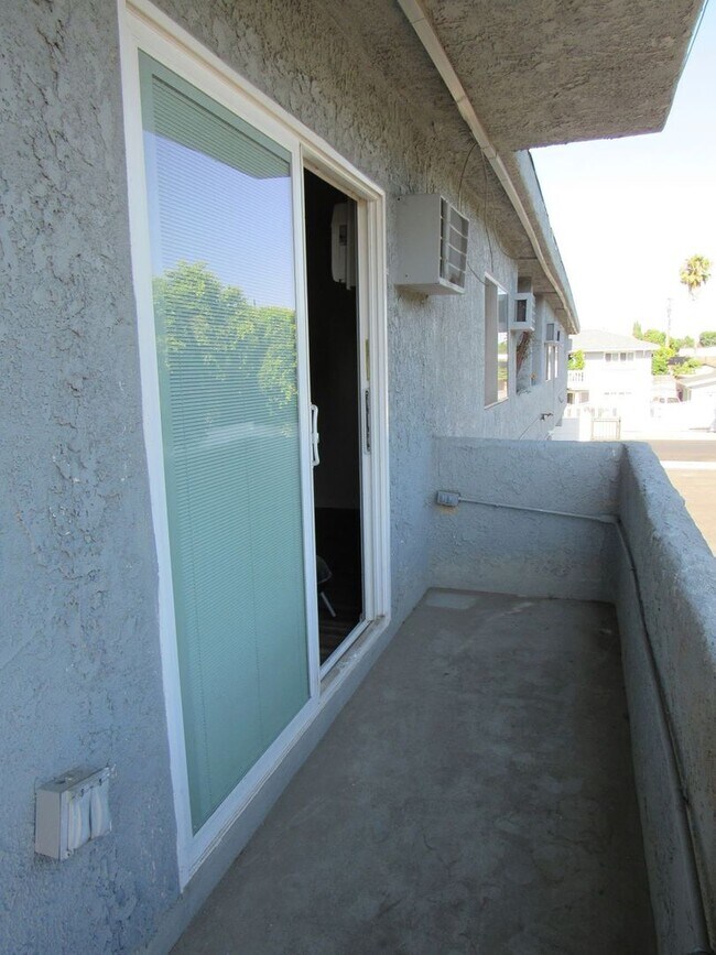 Building Photo - Charming 1-Bedroom Apartment with Modern Upgrades – Move-In Ready!