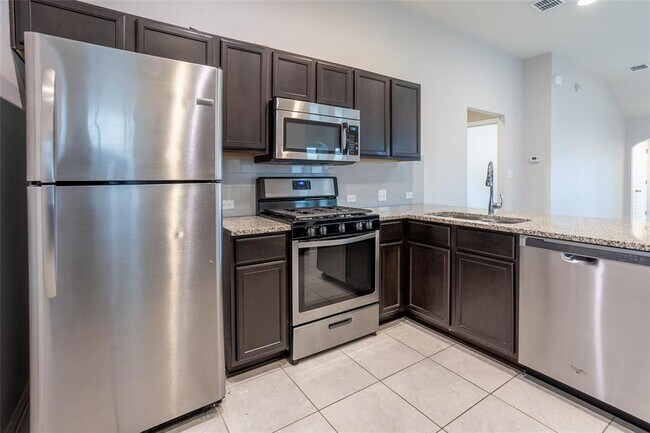 Building Photo - 615 Stampede Rd