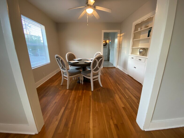 Dining area with built in shelving. - 1620 Branard St