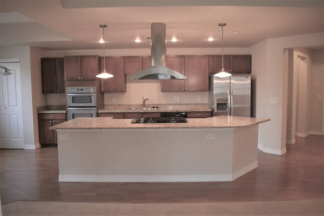 View of kitchen island/workspace - 2200 S University Blvd