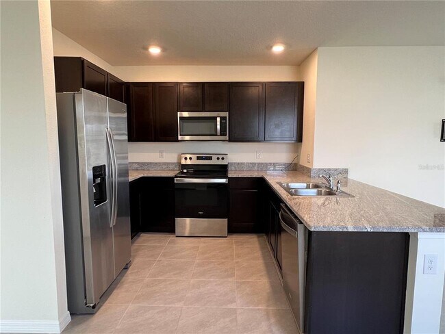 Building Photo - 34012 Jasper Stone Dr