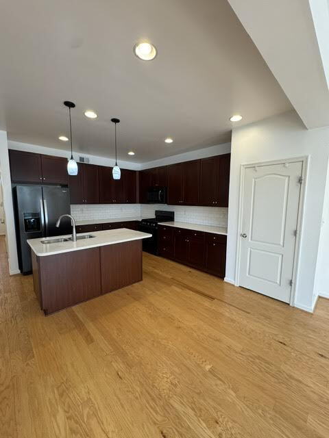 Building Photo - Modern End-Unit Townhome – Solar Powered, Garage, Pet Friendly, and HOA Amenities Included