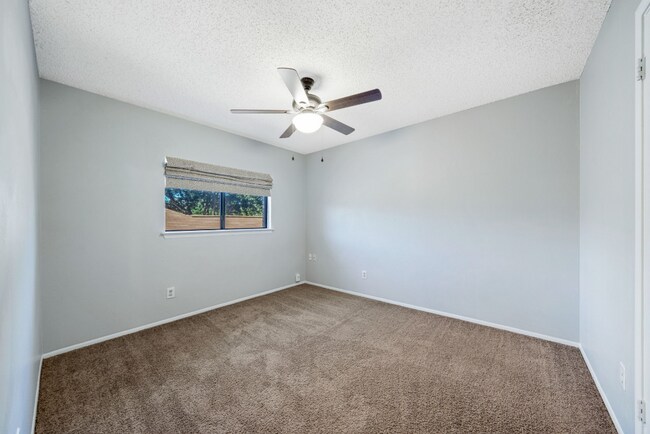 Building Photo - Sign your lease and receive a FREE 50" TV!!!  "Spacious 4-Bedroom Retreat with Fireplace in Charm...