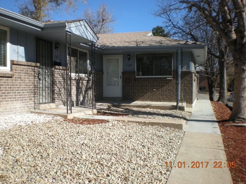 Front exterior of 1160 Clinton with xeriscape yard. - 1160 Clinton St