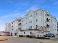 Building Photo - Pet Friendly Condo with Deck and 1 Car Garage