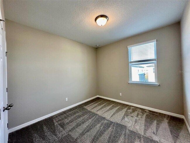 Building Photo - 4869 Lacewing Dr