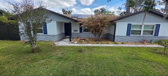 Building Photo - Beautifully Remodeled Lake Front Solar home. Call Sheila Campbell 407-687-7900