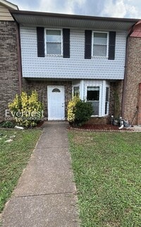 Building Photo - 2 Bed/1.5 Bath Townhome with Fenced Yard / Pet-Friendly / Available Now!