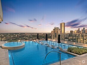 Rooftop pool offering impressive downton views - Hanover Autry Park